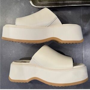 Sorel cream platform slides